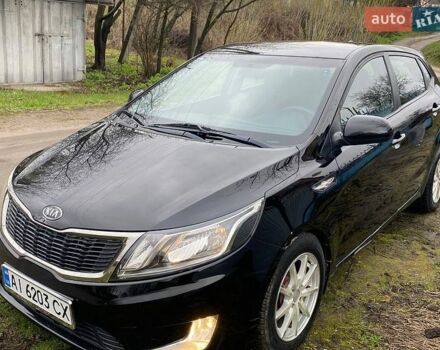Черный Киа Рио, объемом двигателя 1.4 л и пробегом 170 тыс. км за 6700 $, фото 1 на Automoto.ua