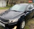Черный Киа Рио, объемом двигателя 1.4 л и пробегом 170 тыс. км за 6700 $, фото 1 на Automoto.ua
