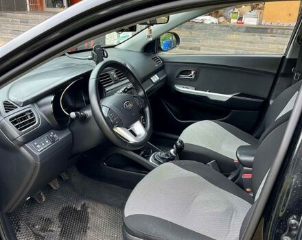 Черный Киа Рио, объемом двигателя 1.6 л и пробегом 17600 тыс. км за 7300 $, фото 4 на Automoto.ua