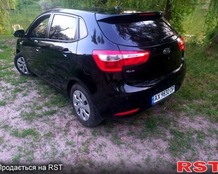 Чорний Кіа Ріо, об'ємом двигуна 1.6 л та пробігом 113 тис. км за 8500 $, фото 7 на Automoto.ua