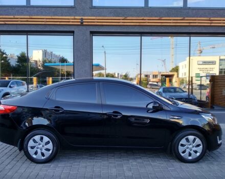 Чорний Кіа Ріо, об'ємом двигуна 1.6 л та пробігом 33 тис. км за 10700 $, фото 7 на Automoto.ua