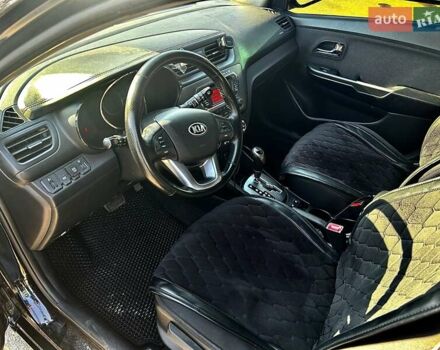 Черный Киа Рио, объемом двигателя 1.59 л и пробегом 107 тыс. км за 8300 $, фото 3 на Automoto.ua