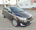 Чорний Кіа Ріо, об'ємом двигуна 1.4 л та пробігом 42 тис. км за 8200 $, фото 14 на Automoto.ua