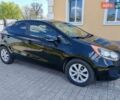 Черный Киа Рио, объемом двигателя 1.6 л и пробегом 149 тыс. км за 7000 $, фото 1 на Automoto.ua