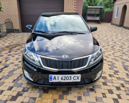 Черный Киа Рио, объемом двигателя 1 л и пробегом 172 тыс. км за 5516 $, фото 1 на Automoto.ua