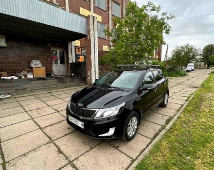 Чорний Кіа Ріо, об'ємом двигуна 1.6 л та пробігом 17600 тис. км за 7300 $, фото 6 на Automoto.ua