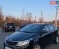 Чорний Кіа Ріо, об'ємом двигуна 1.4 л та пробігом 169 тис. км за 4499 $, фото 2 на Automoto.ua