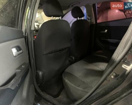Чорний Кіа Ріо, об'ємом двигуна 1.6 л та пробігом 137 тис. км за 2999 $, фото 8 на Automoto.ua
