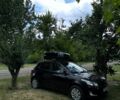 Черный Киа Рио, объемом двигателя 1.6 л и пробегом 160 тыс. км за 7200 $, фото 1 на Automoto.ua