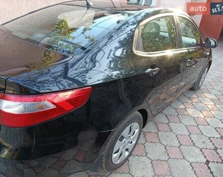 Черный Киа Рио, объемом двигателя 1.4 л и пробегом 53 тыс. км за 8400 $, фото 1 на Automoto.ua