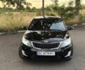 Чорний Кіа Ріо, об'ємом двигуна 1.6 л та пробігом 165 тис. км за 7800 $, фото 1 на Automoto.ua