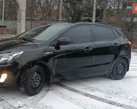 Чорний Кіа Ріо, об'ємом двигуна 1.6 л та пробігом 157 тис. км за 8300 $, фото 2 на Automoto.ua