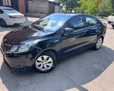 Чорний Кіа Ріо, об'ємом двигуна 1.4 л та пробігом 53 тис. км за 8507 $, фото 3 на Automoto.ua