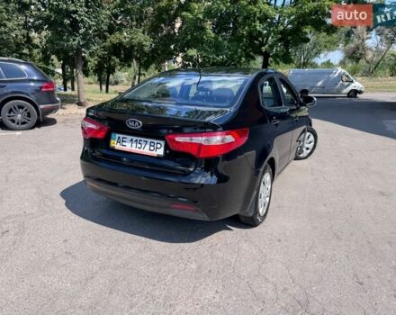Чорний Кіа Ріо, об'ємом двигуна 1.4 л та пробігом 53 тис. км за 8501 $, фото 2 на Automoto.ua