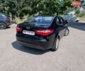 Чорний Кіа Ріо, об'ємом двигуна 1.4 л та пробігом 53 тис. км за 8501 $, фото 2 на Automoto.ua