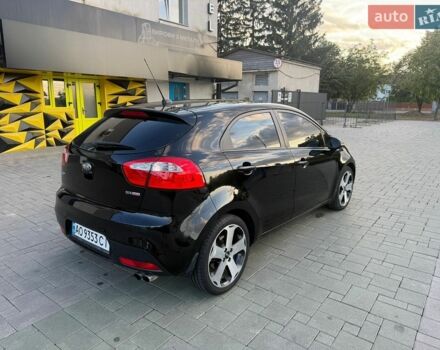 Чорний Кіа Ріо, об'ємом двигуна 1.59 л та пробігом 128 тис. км за 5500 $, фото 1 на Automoto.ua