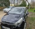 Чорний Кіа Ріо, об'ємом двигуна 1.1 л та пробігом 143 тис. км за 6830 $, фото 1 на Automoto.ua