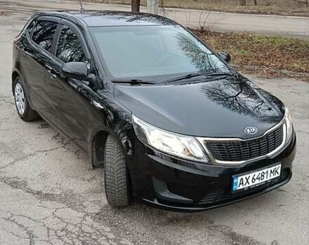 Чорний Кіа Ріо, об'ємом двигуна 1.4 л та пробігом 161 тис. км за 6850 $, фото 11 на Automoto.ua