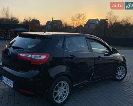 Чорний Кіа Ріо, об'ємом двигуна 1.4 л та пробігом 169 тис. км за 4499 $, фото 6 на Automoto.ua