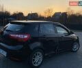 Чорний Кіа Ріо, об'ємом двигуна 1.4 л та пробігом 169 тис. км за 4499 $, фото 6 на Automoto.ua