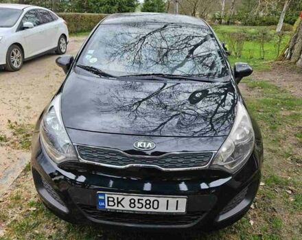 Чорний Кіа Ріо, об'ємом двигуна 1.1 л та пробігом 143 тис. км за 6830 $, фото 3 на Automoto.ua