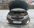 Чорний Кіа Ріо, об'ємом двигуна 1.6 л та пробігом 157 тис. км за 8300 $, фото 5 на Automoto.ua