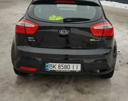 Чорний Кіа Ріо, об'ємом двигуна 1.1 л та пробігом 143 тис. км за 6830 $, фото 3 на Automoto.ua