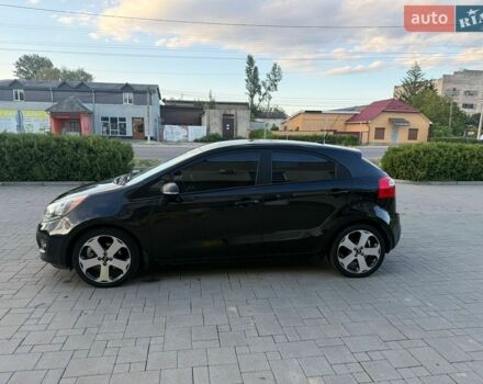 Чорний Кіа Ріо, об'ємом двигуна 1.59 л та пробігом 128 тис. км за 5500 $, фото 3 на Automoto.ua