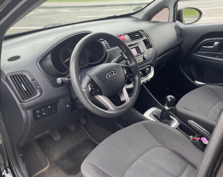 Чорний Кіа Ріо, об'ємом двигуна 1.2 л та пробігом 200 тис. км за 5700 $, фото 7 на Automoto.ua