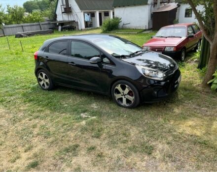 Черный Киа Рио, объемом двигателя 1.4 л и пробегом 160 тыс. км за 5000 $, фото 1 на Automoto.ua