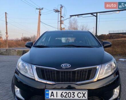 Чорний Кіа Ріо, об'ємом двигуна 1.4 л та пробігом 169 тис. км за 4499 $, фото 7 на Automoto.ua
