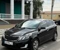 Черный Киа Рио, объемом двигателя 1.59 л и пробегом 127 тыс. км за 7600 $, фото 1 на Automoto.ua