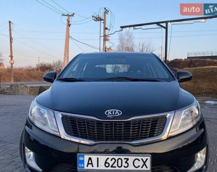 Черный Киа Рио, объемом двигателя 1.4 л и пробегом 170 тыс. км за 6700 $, фото 2 на Automoto.ua