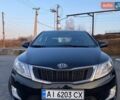 Черный Киа Рио, объемом двигателя 1.4 л и пробегом 170 тыс. км за 6700 $, фото 2 на Automoto.ua