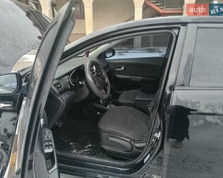 Чорний Кіа Ріо, об'ємом двигуна 1.6 л та пробігом 157 тис. км за 8300 $, фото 4 на Automoto.ua