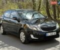 Черный Киа Рио, объемом двигателя 1.59 л и пробегом 203 тыс. км за 6199 $, фото 1 на Automoto.ua