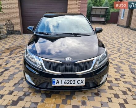 Черный Киа Рио, объемом двигателя 1.4 л и пробегом 172 тыс. км за 5700 $, фото 1 на Automoto.ua