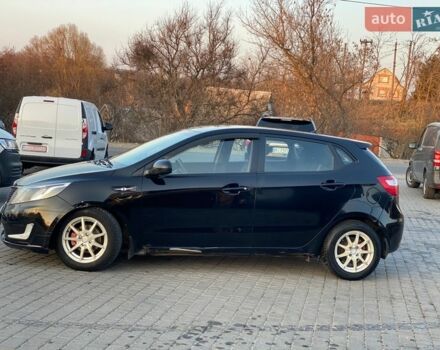 Чорний Кіа Ріо, об'ємом двигуна 1.4 л та пробігом 169 тис. км за 4499 $, фото 3 на Automoto.ua