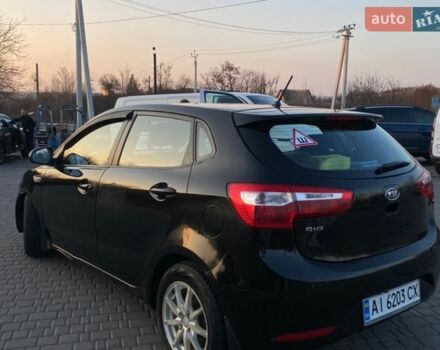 Чорний Кіа Ріо, об'ємом двигуна 1.4 л та пробігом 169 тис. км за 4499 $, фото 5 на Automoto.ua
