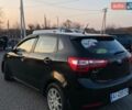 Чорний Кіа Ріо, об'ємом двигуна 1.4 л та пробігом 169 тис. км за 4499 $, фото 5 на Automoto.ua