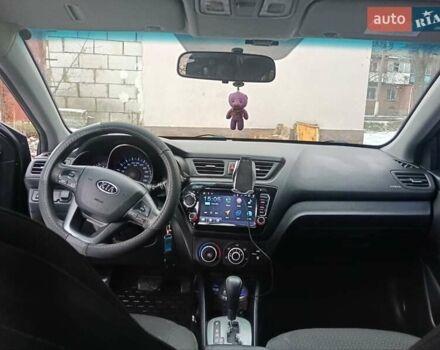 Чорний Кіа Ріо, об'ємом двигуна 1.6 л та пробігом 157 тис. км за 8300 $, фото 3 на Automoto.ua