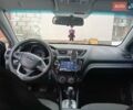 Чорний Кіа Ріо, об'ємом двигуна 1.6 л та пробігом 157 тис. км за 8300 $, фото 3 на Automoto.ua