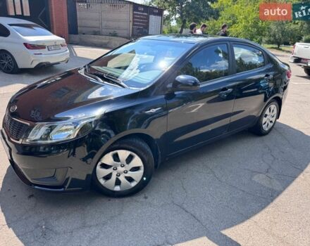 Чорний Кіа Ріо, об'ємом двигуна 1.4 л та пробігом 53 тис. км за 8501 $, фото 3 на Automoto.ua