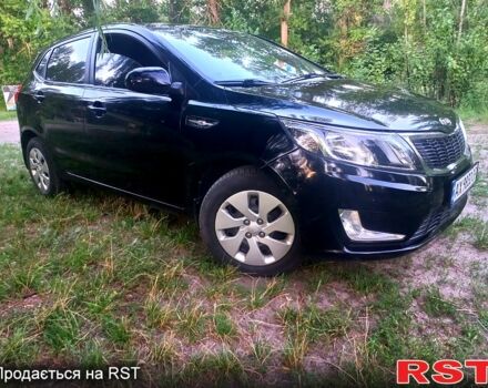 Чорний Кіа Ріо, об'ємом двигуна 1.6 л та пробігом 113 тис. км за 8500 $, фото 1 на Automoto.ua