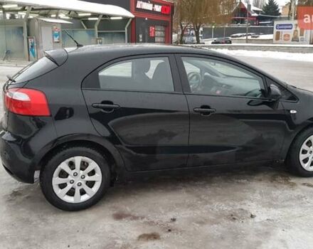 Чорний Кіа Ріо, об'ємом двигуна 1.1 л та пробігом 143 тис. км за 6830 $, фото 5 на Automoto.ua
