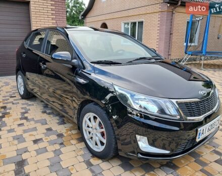 Черный Киа Рио, объемом двигателя 1.4 л и пробегом 172 тыс. км за 5700 $, фото 2 на Automoto.ua
