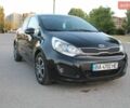 Черный Киа Рио, объемом двигателя 1.12 л и пробегом 235 тыс. км за 6200 $, фото 1 на Automoto.ua