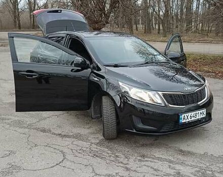 Чорний Кіа Ріо, об'ємом двигуна 1.4 л та пробігом 161 тис. км за 6850 $, фото 24 на Automoto.ua