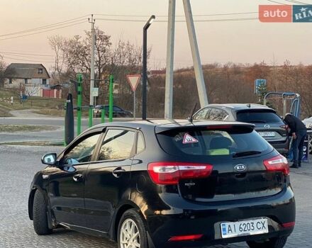Черный Киа Рио, объемом двигателя 1.4 л и пробегом 170 тыс. км за 6700 $, фото 3 на Automoto.ua