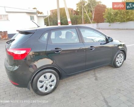 Чорний Кіа Ріо, об'ємом двигуна 1.4 л та пробігом 42 тис. км за 8200 $, фото 8 на Automoto.ua